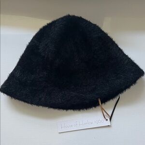 Black fuzzy hat by House of Harlow 1960 faux fur